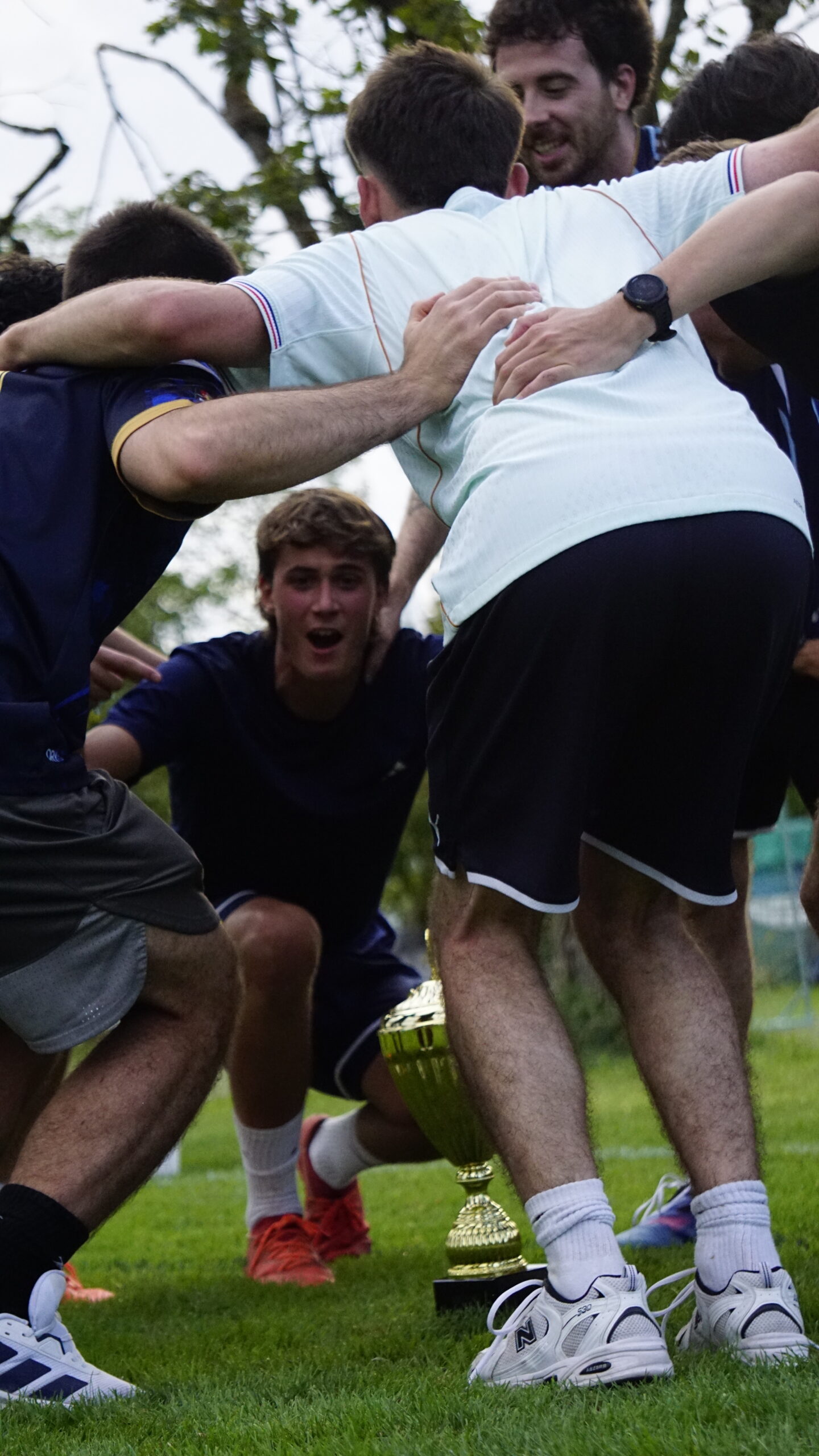 Players celebrating together at the Summer Cup